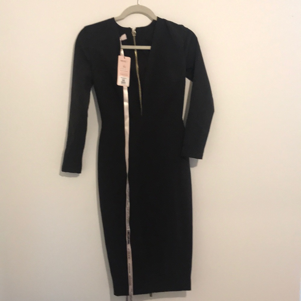 Sleek sexy slit down the front long sleeve